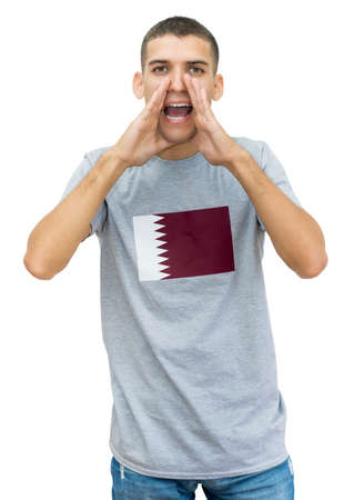 Happy soccer fan with flag of Qatar on jerseyの写真素材
