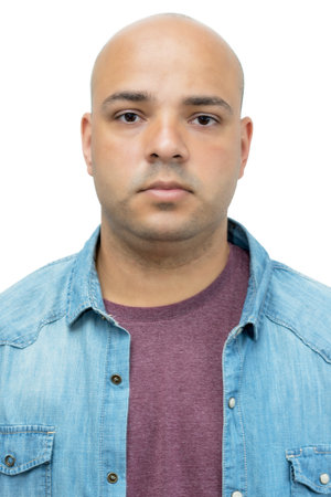 Passport photo of serious bald adult man isolated on white background for cut outの写真素材