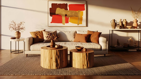 Living room showing cozy living room with beige sofa rust and brown abstract and wooden stump...