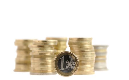one euro and coins money piles over whiteの写真素材