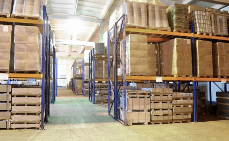 rack stack arrangement of cardboard boxes in a warehouseの写真素材