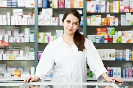 Pharmacy chemist woman in drugstoreの写真素材