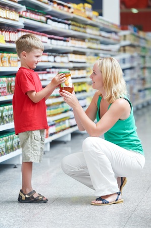 woman and boy making shoppingの写真素材