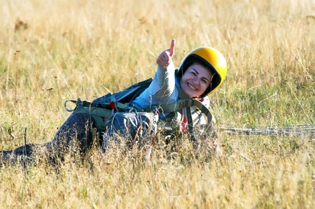 Parachute jumper after landingの写真素材