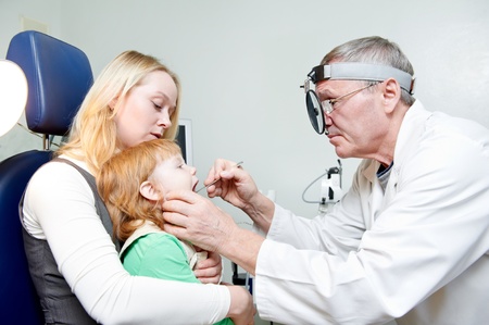 Medical otitus examination of child doctorの写真素材