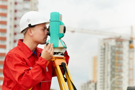 surveyor works with theodoliteの写真素材