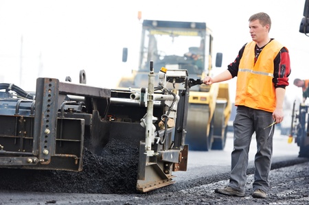 worker at asphalting works