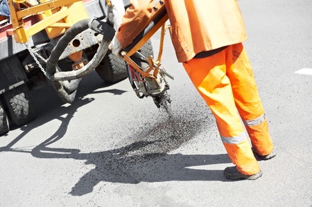 Asphalt patching roadworksの写真素材
