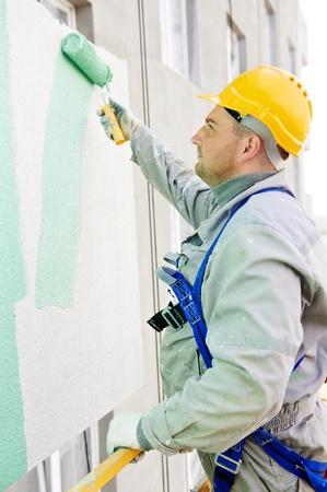 builder facade painter at workの写真素材