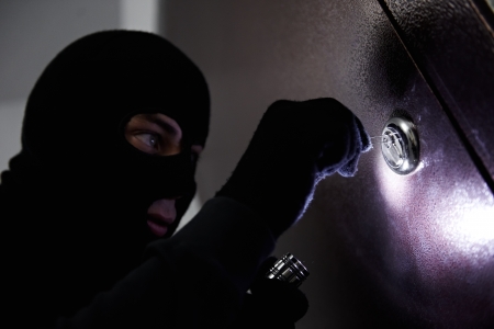 thief burglar at house breaking