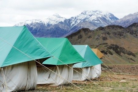 tourist camp tents in mountainsの写真素材