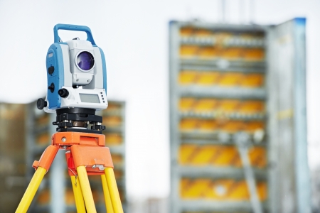 Surveyor equipment tacheometer or theodolite outdoors at construction siteの写真素材