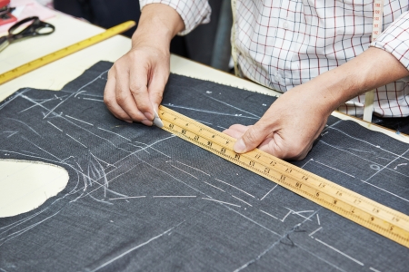 Tailor hands at works