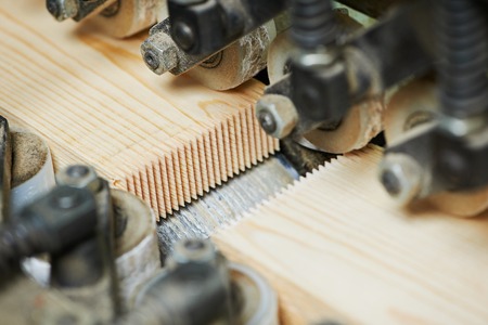 Wood plank finger jointing process on factory manufacture production lineの写真素材