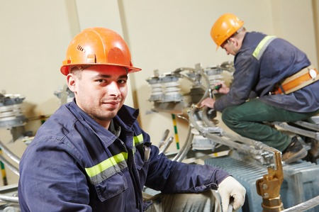 Industrial electrician lineman repairman workers teamの写真素材