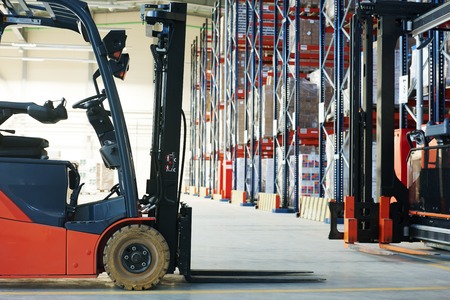 forklift loader pallet stacker truck equipment at warehouseの写真素材
