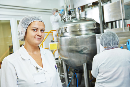 portrait of female pharmaceutical factory worker in pharmacy industry manufacture factory