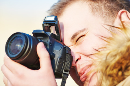close-up of amateur photographer preparing to photographの写真素材