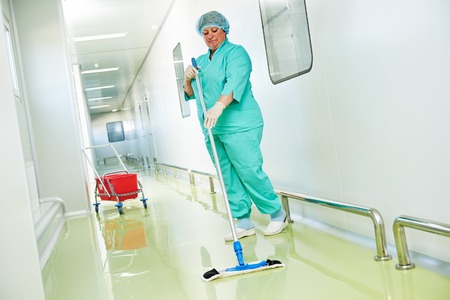 Floor care and cleaning services with washing mop in sterile factory or clean hospitalの写真素材