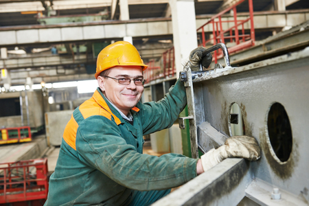 industrial worker at house-building plant factory workshop