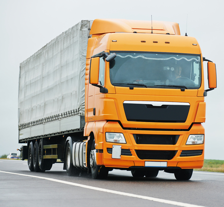 Lorry with trailer on highway autobahn interstate roadの写真素材