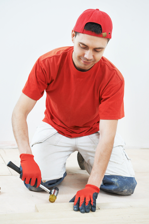 electrician engineer works with cables at distribution boxes in electric networkの写真素材