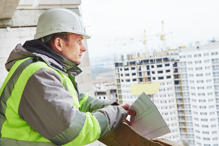 foreman builder and construction worker portrait in front of building area