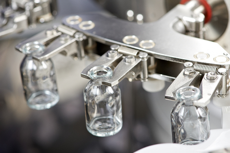 pharmaceutical medicine industrial washer cleaning and drying bottlesの写真素材