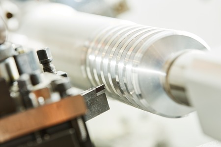 cutting tool at metal working on lathe machine