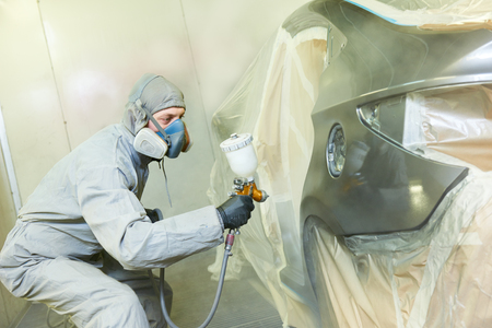 repairman painter in chamber painting automobile car bonnetの写真素材