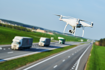drone and transportation. drone with camera controls highway road conditionsの写真素材