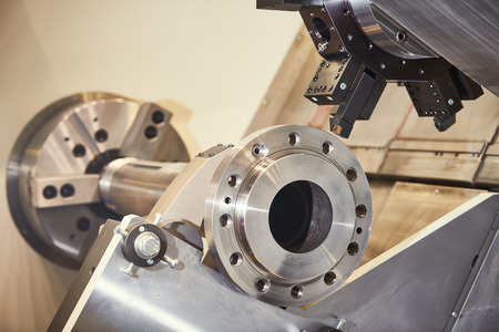 cutting flange and shaft at metal working on lather machine