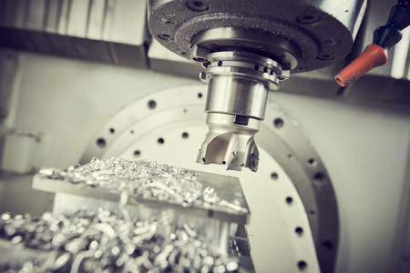milling at CNC machine. industrial metalworking cutting process by cutter