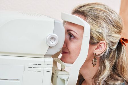 ophthalmology. eyesight check of adult female womanの写真素材