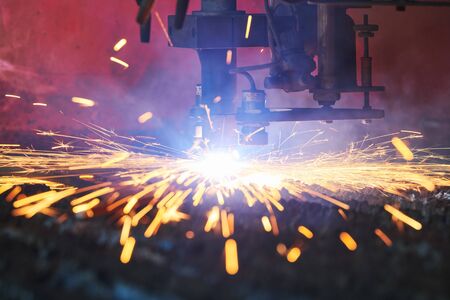 Gas plasma cutting. Metal machining with sparks on CNC maching
