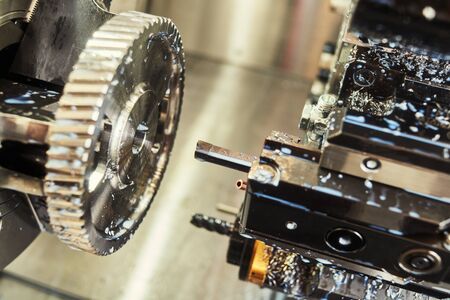 turning cnc machine at metal work industry. Precision manufacturing and machining