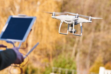 drone quadcopter with digital camera flyingの写真素材