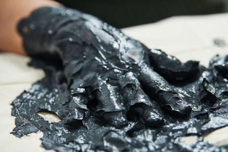 Mud therapy for hand rehabilitation and skin careの写真素材