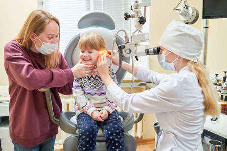 Ear, nose, throat examining. doctor with a child and endoscope. otolaryngologyの写真素材