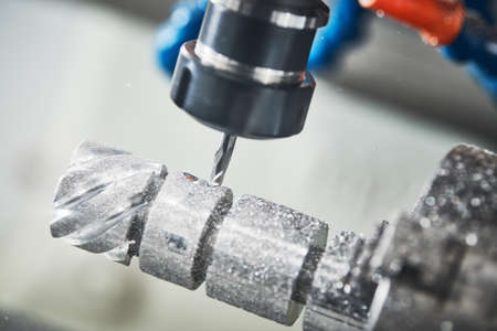 Precision machining metal detail on CNC milling machine