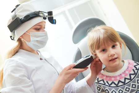 ENT medical examination of little girlの写真素材