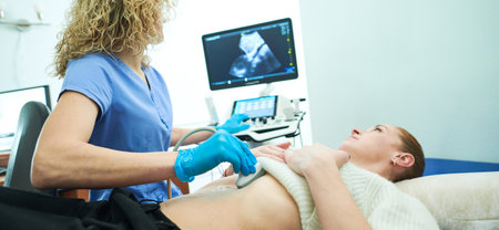 ultrasound scan. Examining stomach of female patientの写真素材