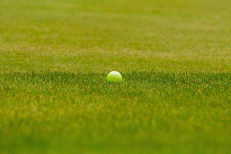 Player a during a golf game during a hitの写真素材
