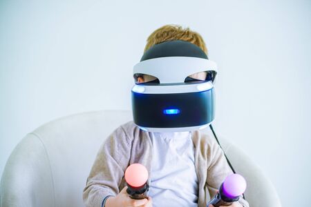 The boy wearing virtual reality glasses