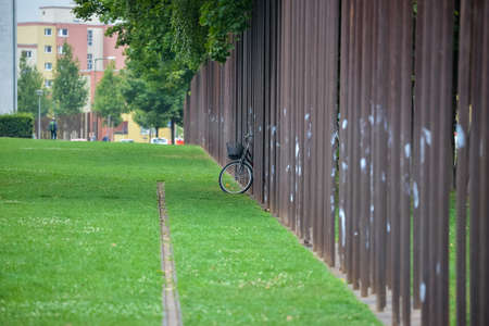 People watching to Berlin Wallのeditorial素材