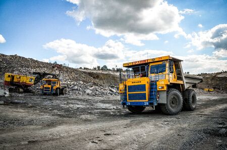 Production Mining of granite stone by quarrying machines in Mikashevichiの写真素材