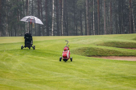 Playing golf. Golf course and Bagのeditorial素材