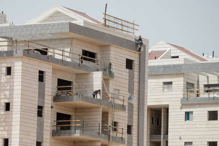 Israel. Tel Aviv. 15 APRIL 2015. Construction of a new area near Tel Aviv. Unfinished building. Construction process.のeditorial素材