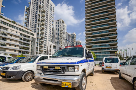Israel. Tel Aviv. APRIL 15, 2015. A tour of the apartment. Expensive housing. District of millionaires. Skyscrapers, police carのeditorial素材