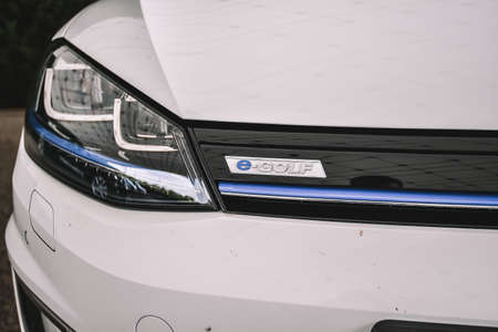 Wolfsburg, Germany - June 19, 2016: Volkswagen VW e-Golf electric car on the city streets. Volkswagen is a German car manufacturer headquartered in Wolfsburg, Germany.のeditorial素材